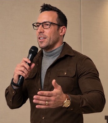Frank DiMasi speaking to a group